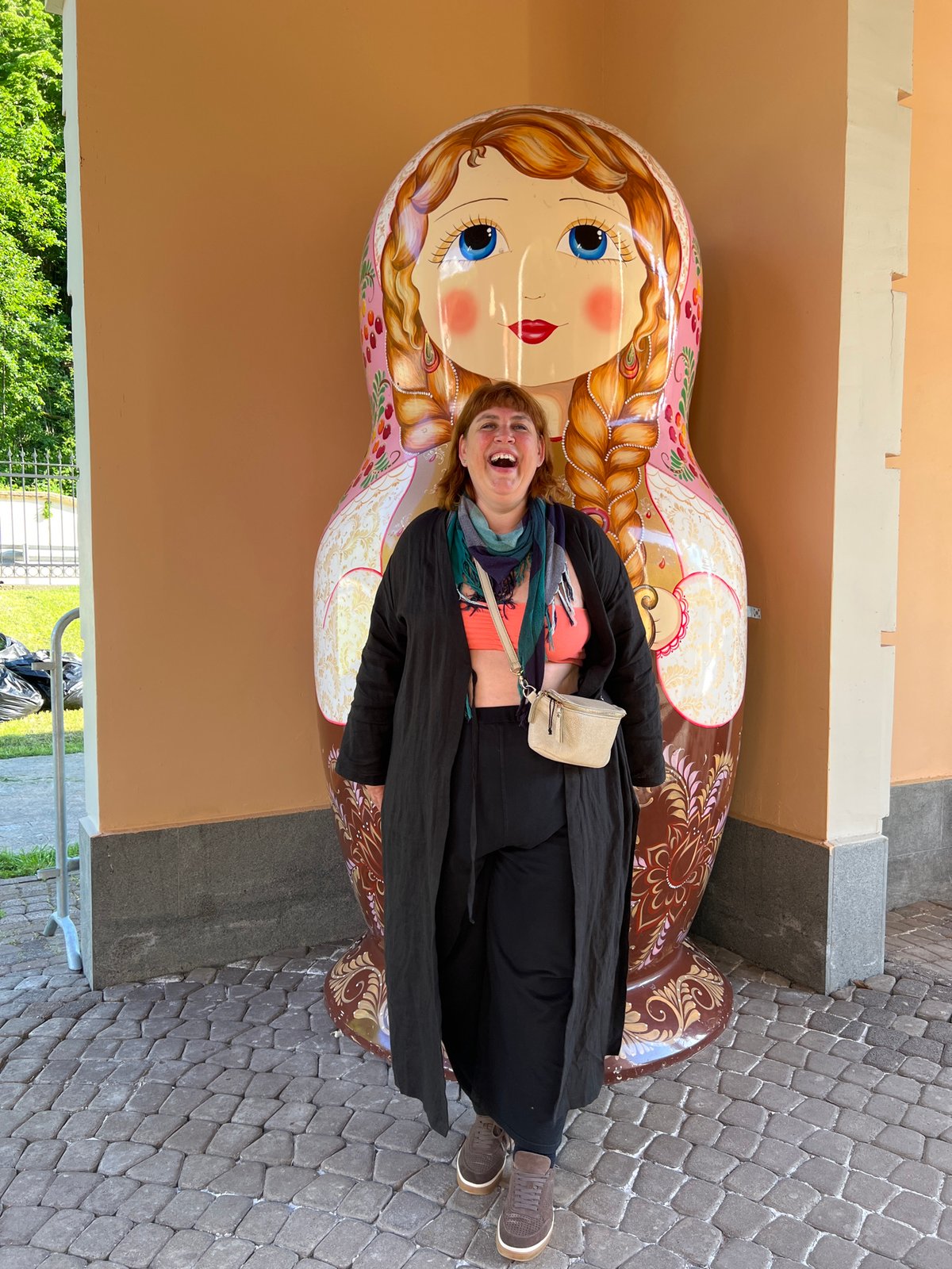 Tourist visits folk art displays in Estosadok, Russia