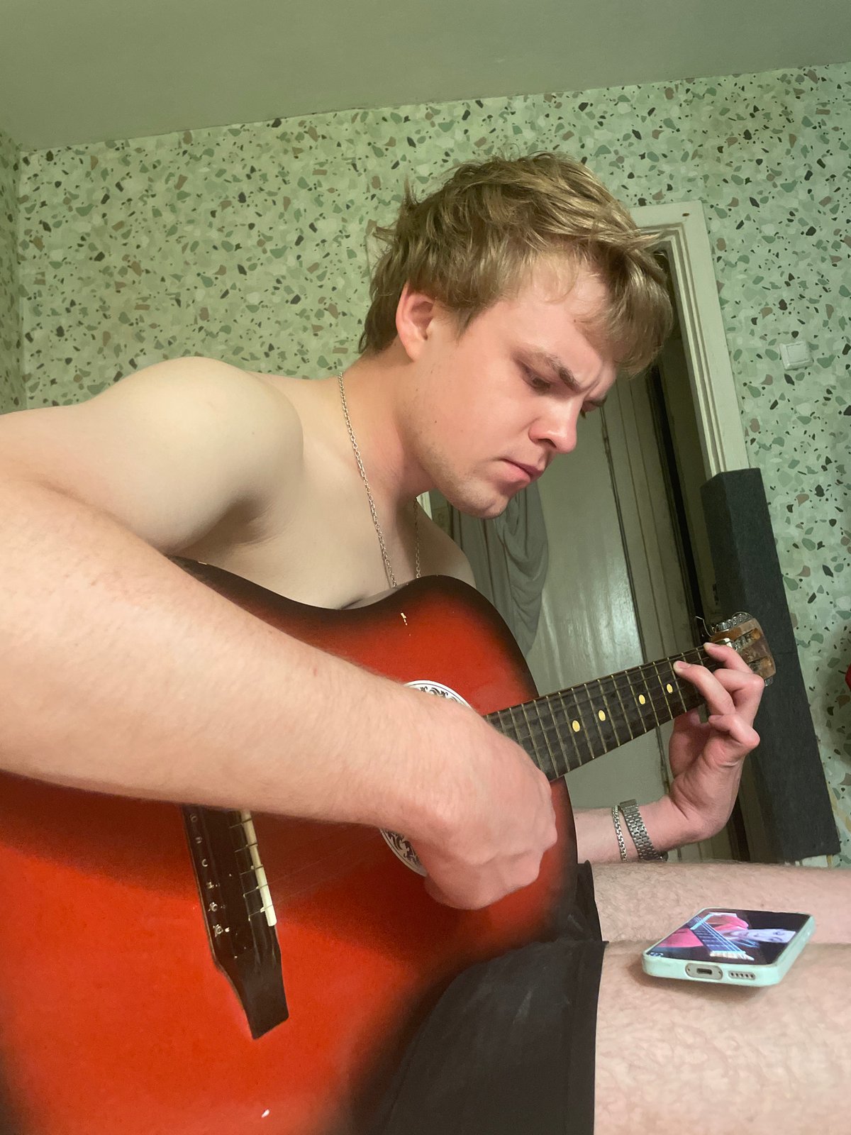 Acoustic guitar session and selfie from a bedroom