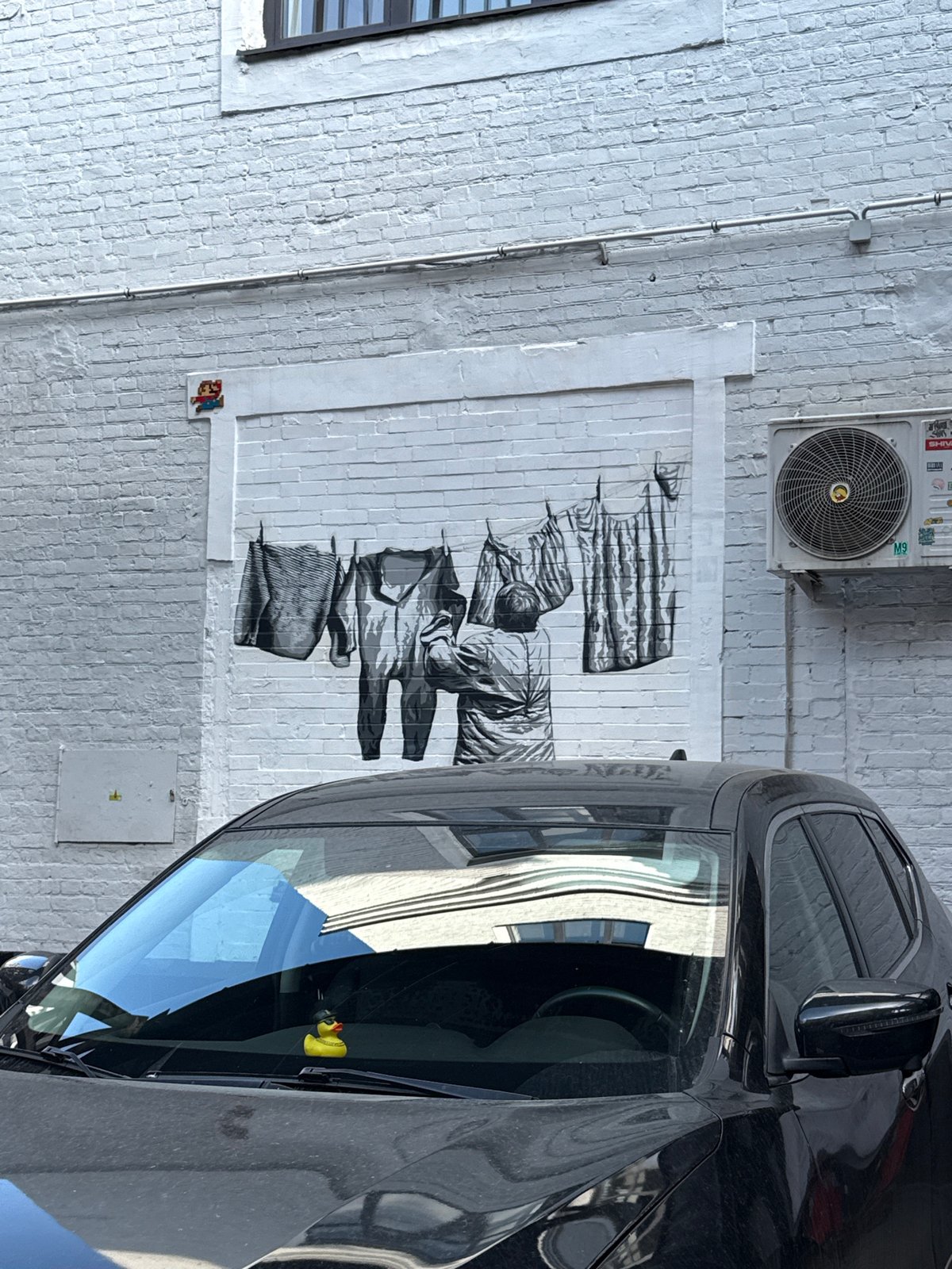 Moscow street mural and surrounding urban block, July 2026