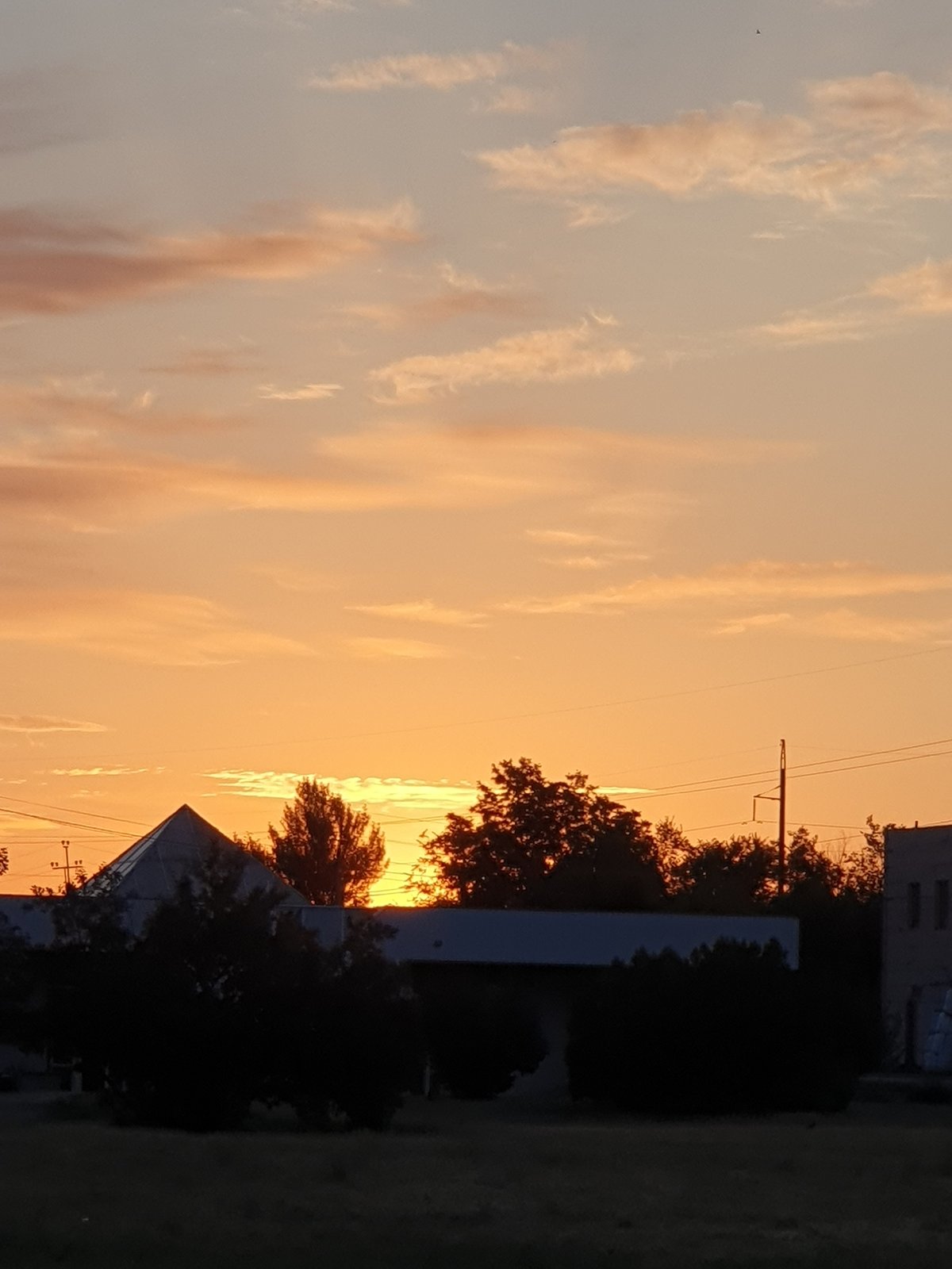Dusk gradients and a crescent moon in back-to-back sky shots