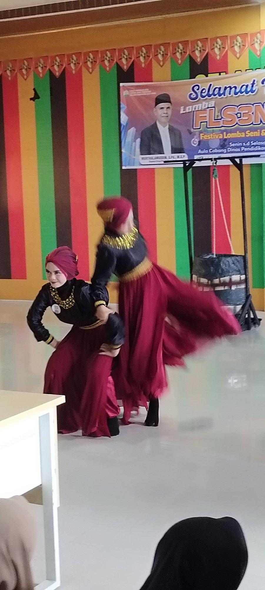 Traditional dance performances and art project captured in indoor venues