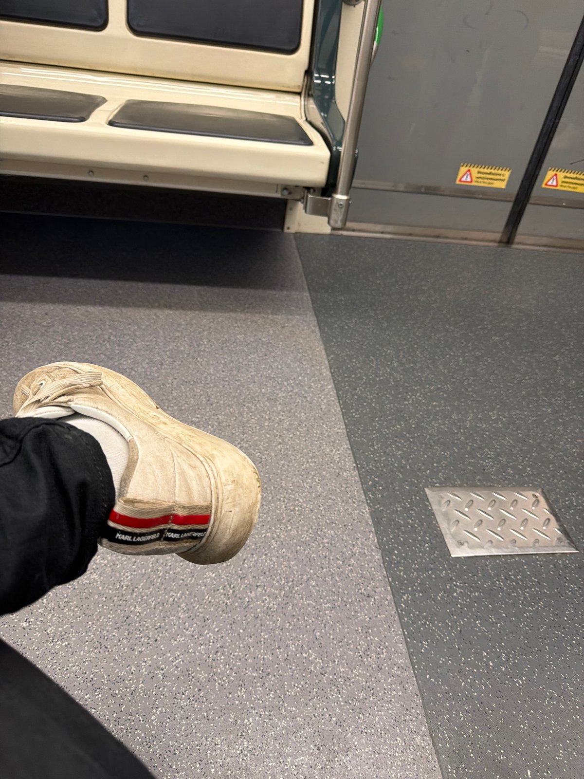Passenger rides public transport in Sofia wearing designer sneakers