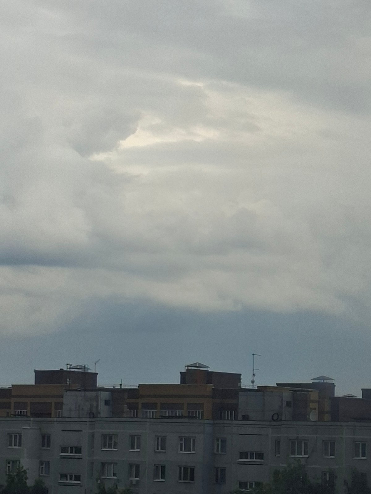 Rooftop views over Kazan's concrete apartment blocks on a grey day