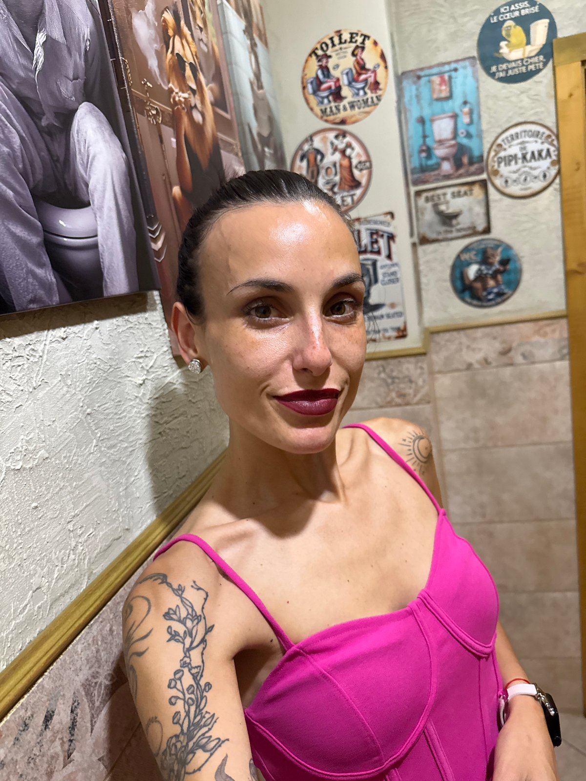 Woman documents dining experience at restaurant in Pleven, Bulgaria