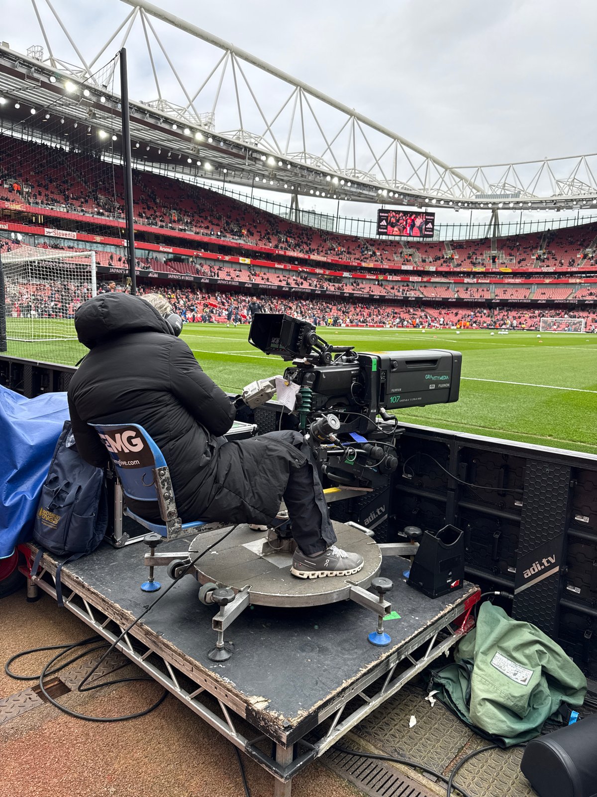 Camera operator working at Arsenal stadium in London