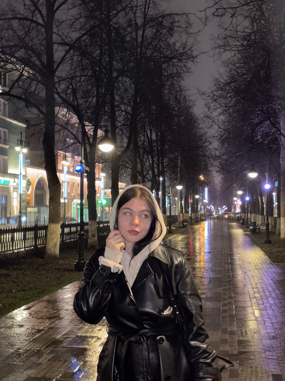 Young woman in contemplative pose captured in Perm, Russia
