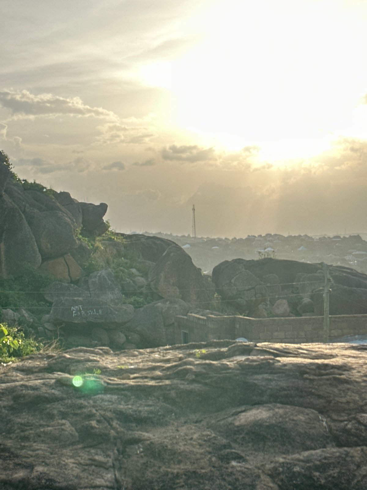 Daily life documented amid Jos Nigeria's granite boulder landscape