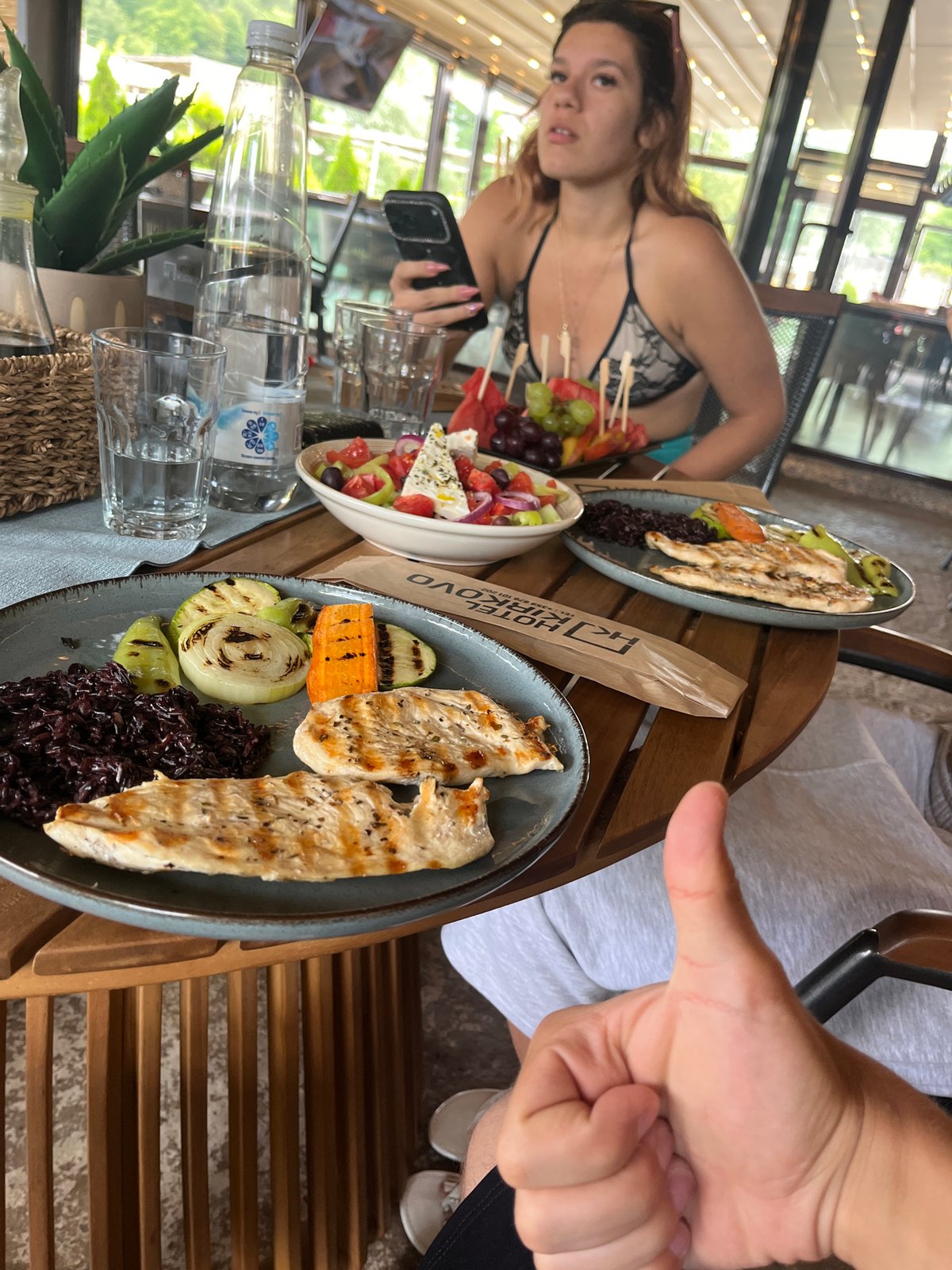 Casual beachside lunch at an open-air restaurant