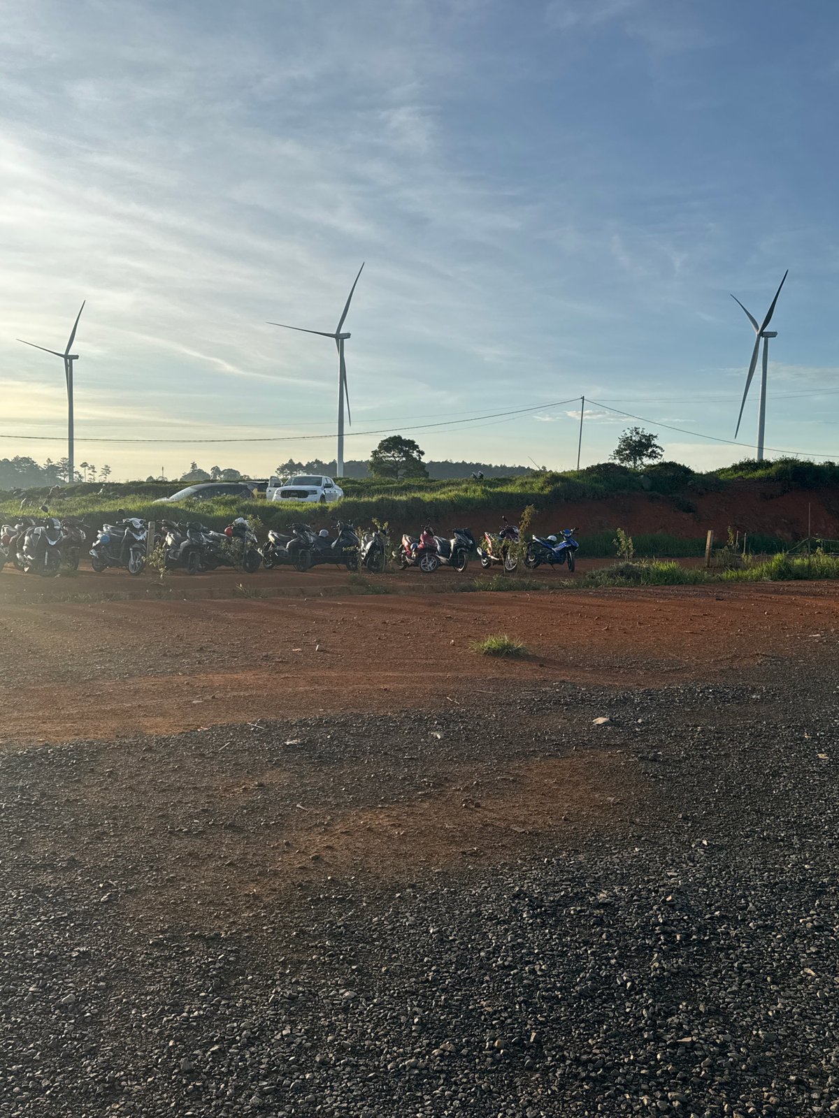 Evening visit to Phát Chi's wind turbines and tea-covered hills