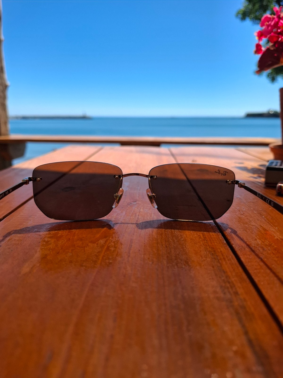 Sunglasses on a table at a seaside cafe in Tsarevo
