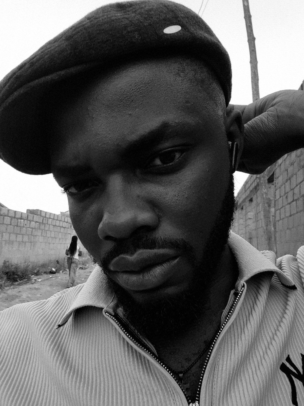 Portrait session captured in Jos, Nigeria roadside setting