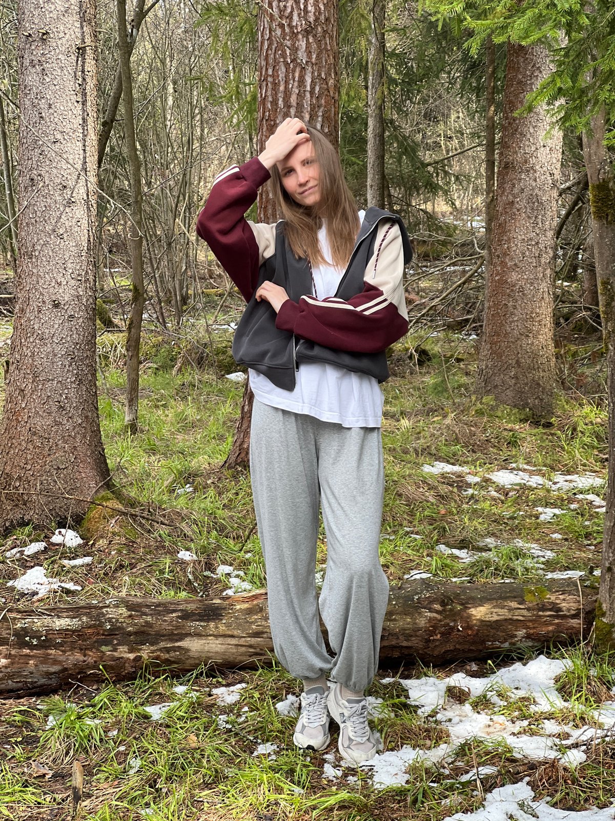 Woman conducts forest photo session in Раздолье, Russia