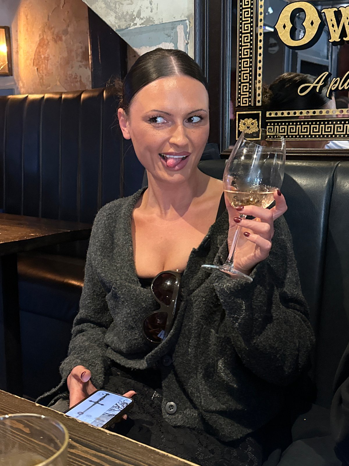 Woman photographed at Owl & Pussycat pub in London