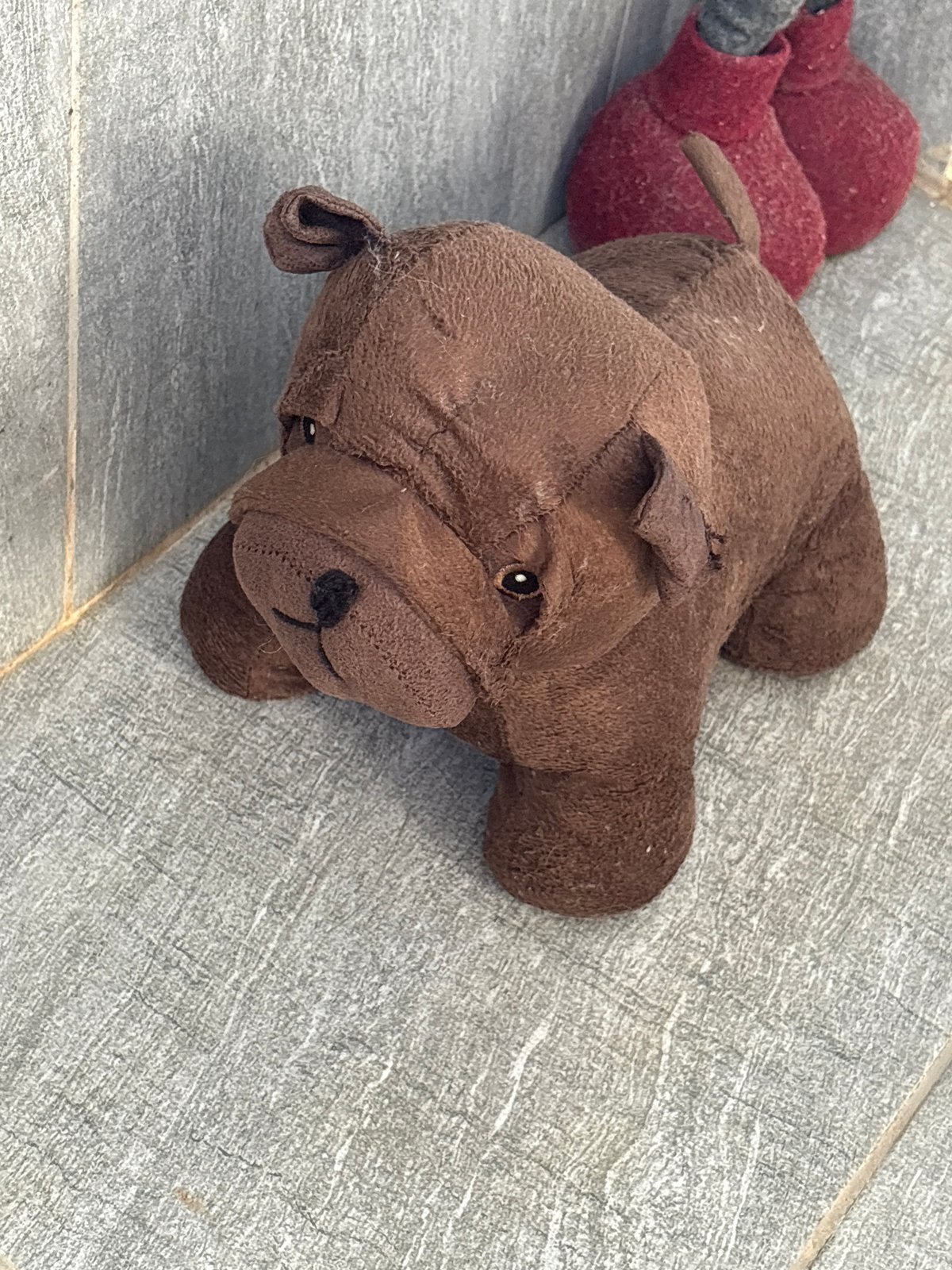 Stuffed bear and gaming setup documented in morning hours