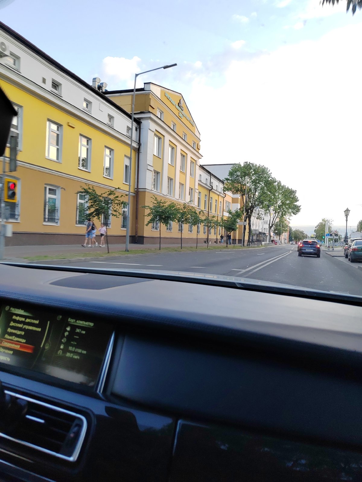 Evening drive through central Brest, Belarus past cathedral and overpasses