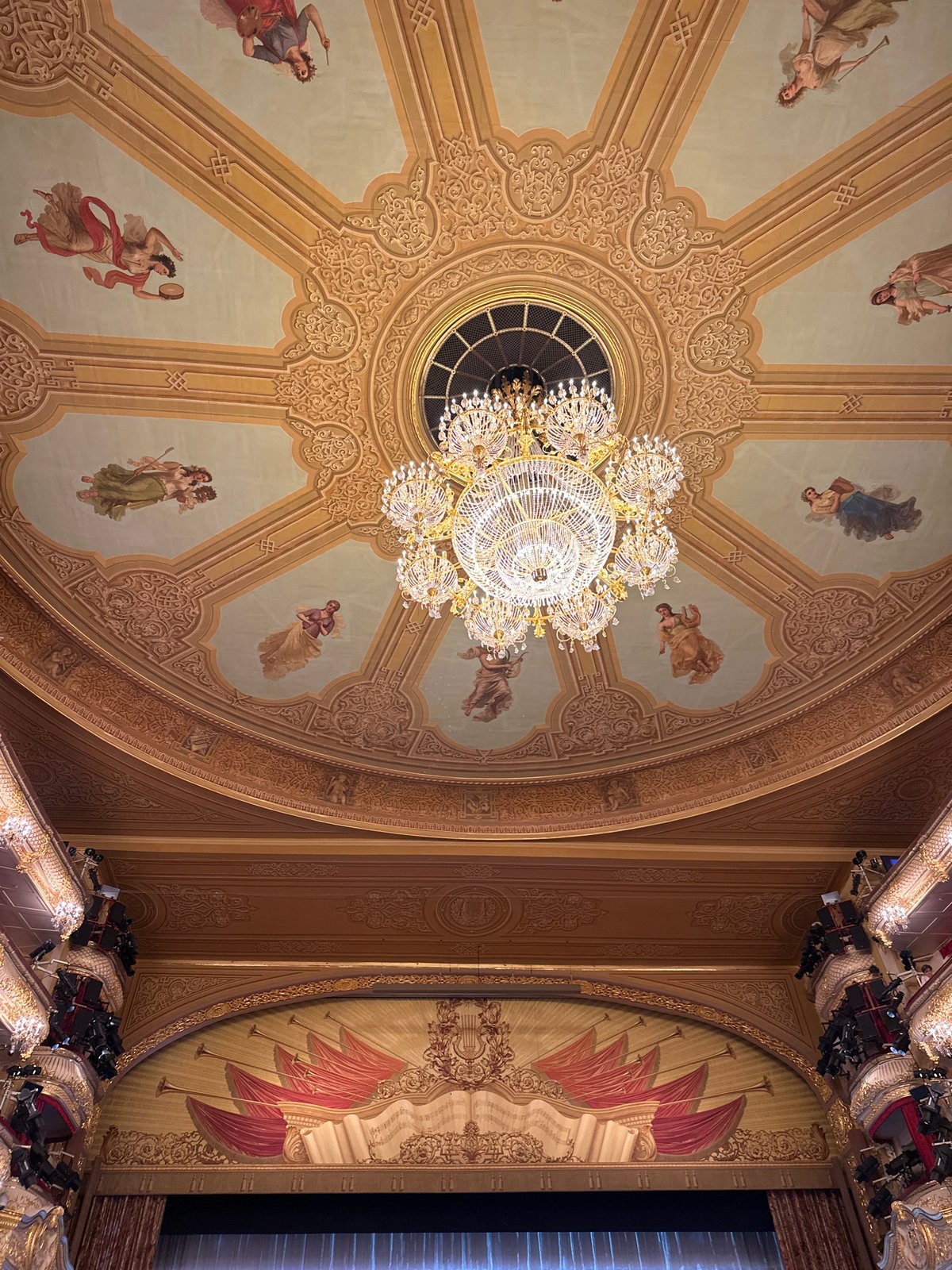 Moscow theatre's ornate ceiling and chandelier captured in photograph