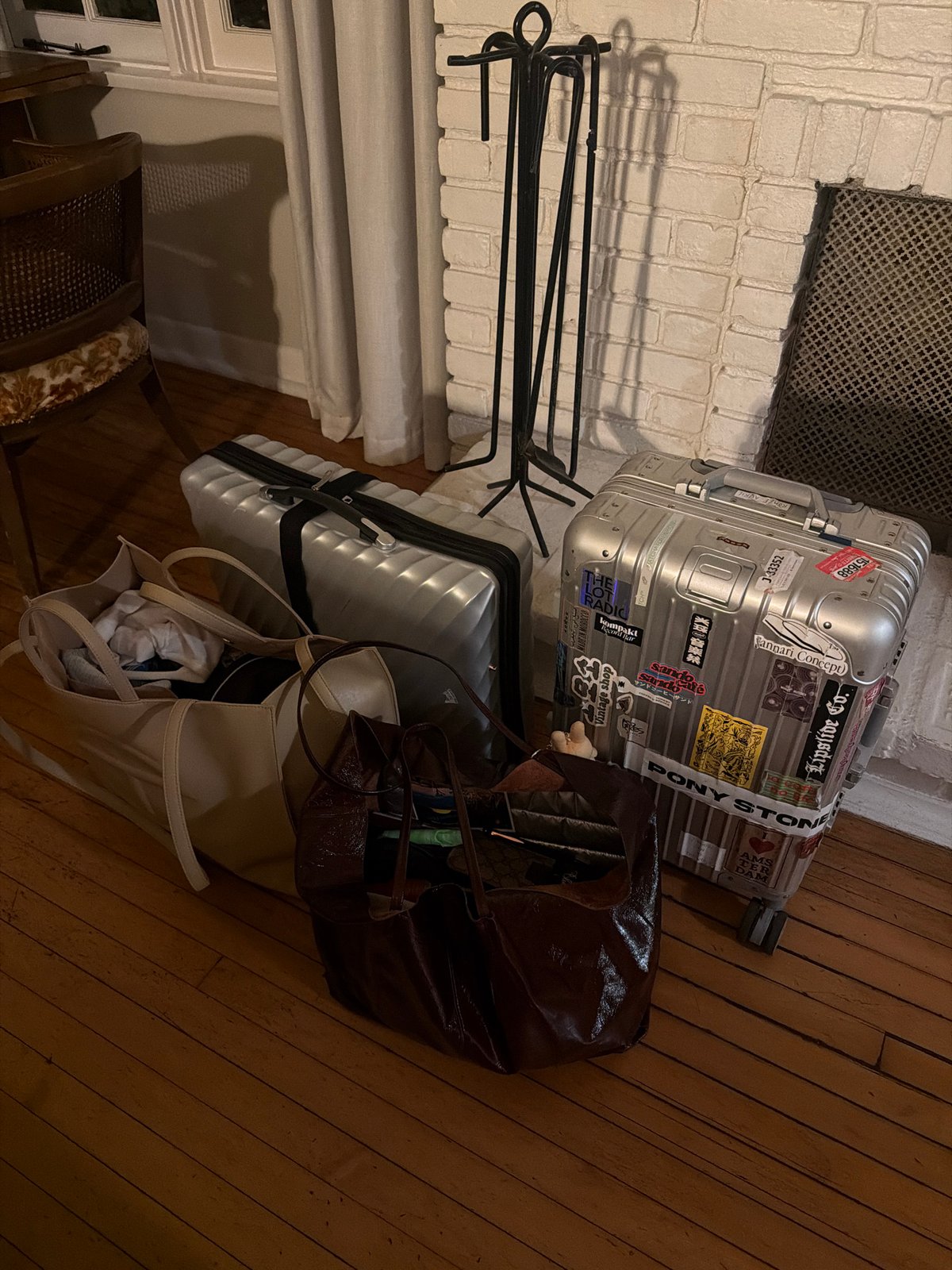 Los Angeles resident documents luggage arrangement during early morning hours