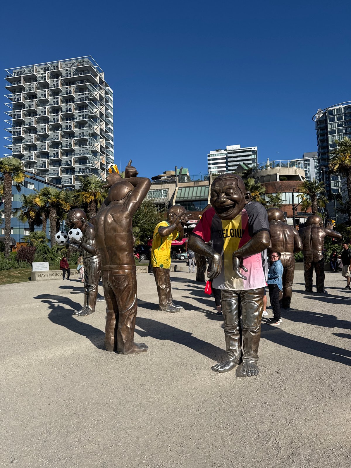 Vancouver's laughing bronze statues captured at Morton Park