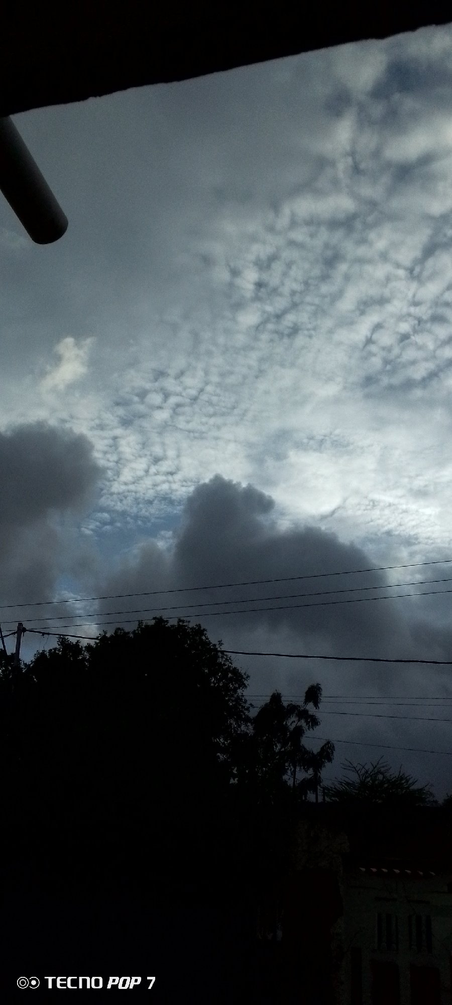 Storm clouds gather over Altagracia on a moody June morning
