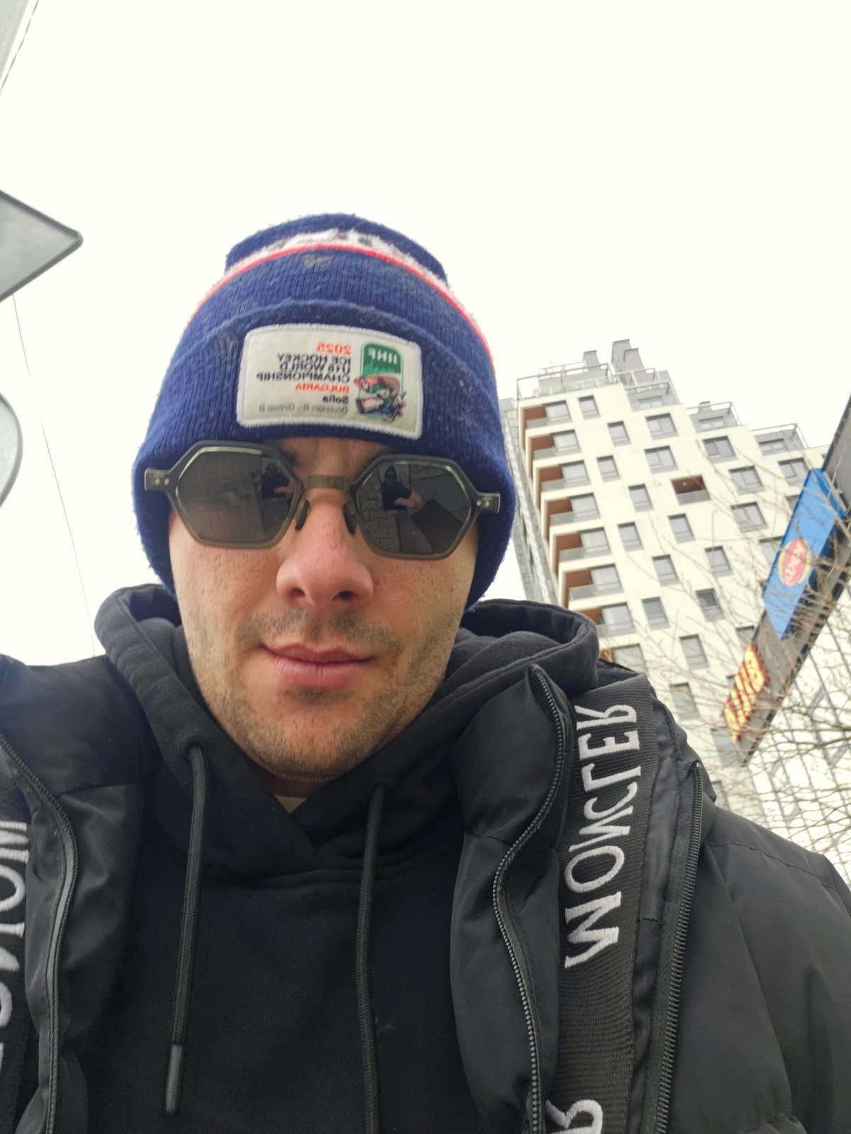 Man takes morning selfie in Sofia wearing designer jacket