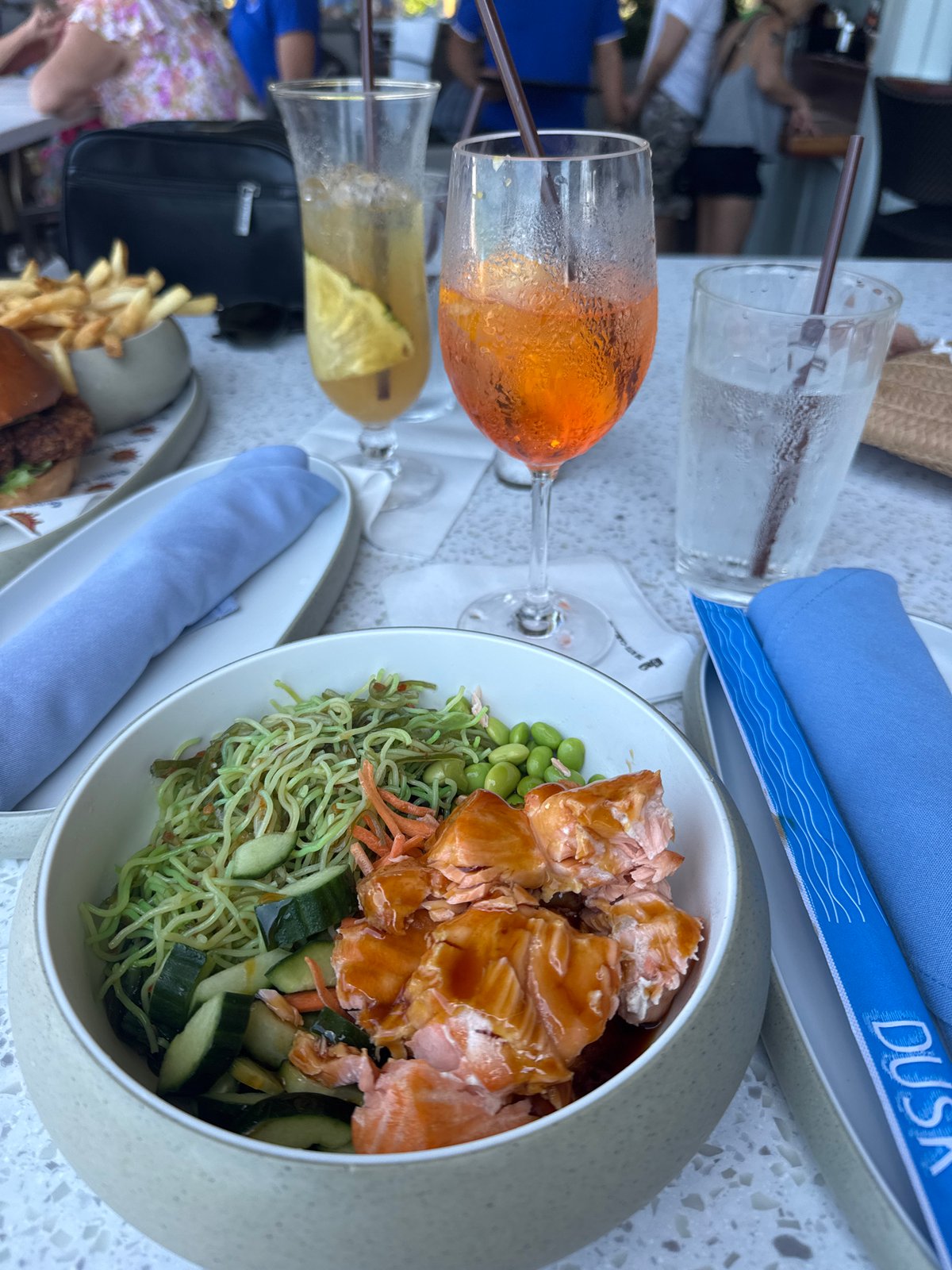 Dining and drinks captured at Pelican Bay beachside locations