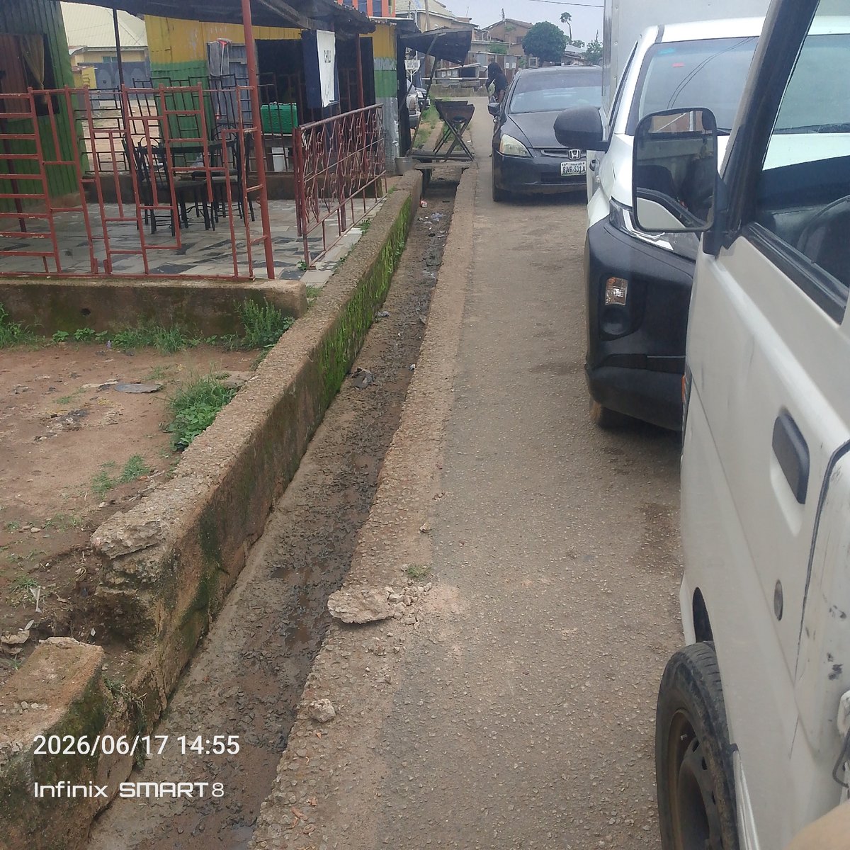 Street life, cement runs, and roadside snacks in a West African neighborhood