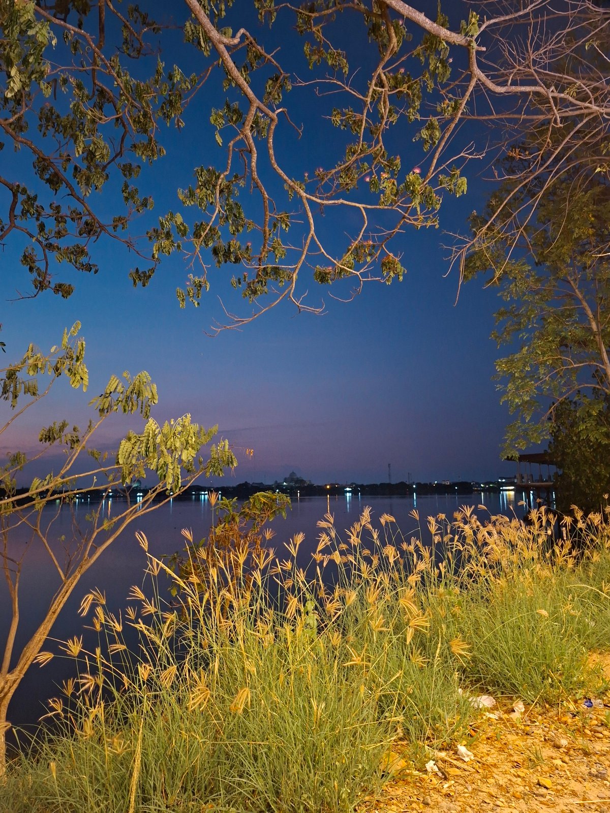 Evening scenes documented across Lhokseumawe's illuminated waterfront district