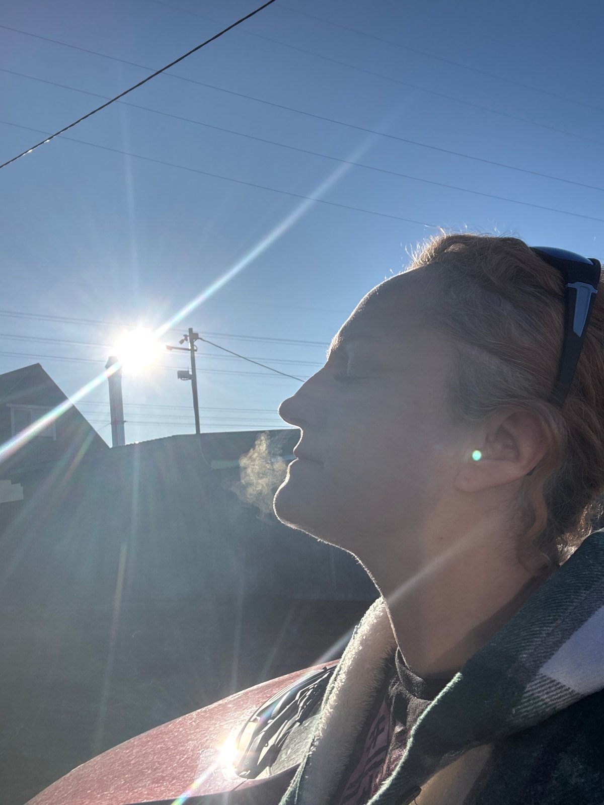 Person photographed in backlit outdoor scene in Chaikovsky, Russia