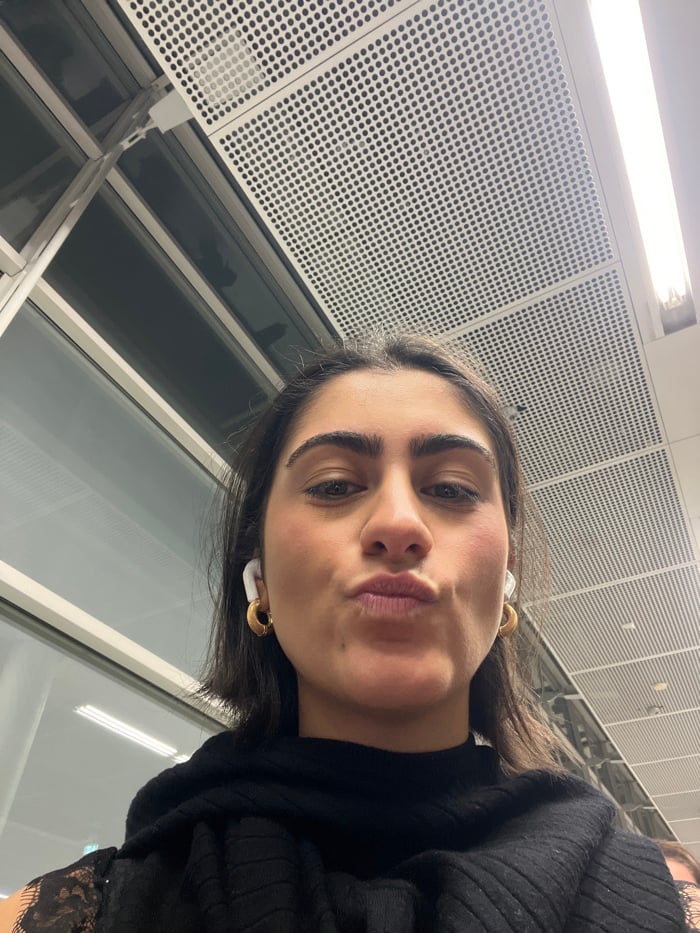 Woman takes selfies, eats fruit pouches at French airport
