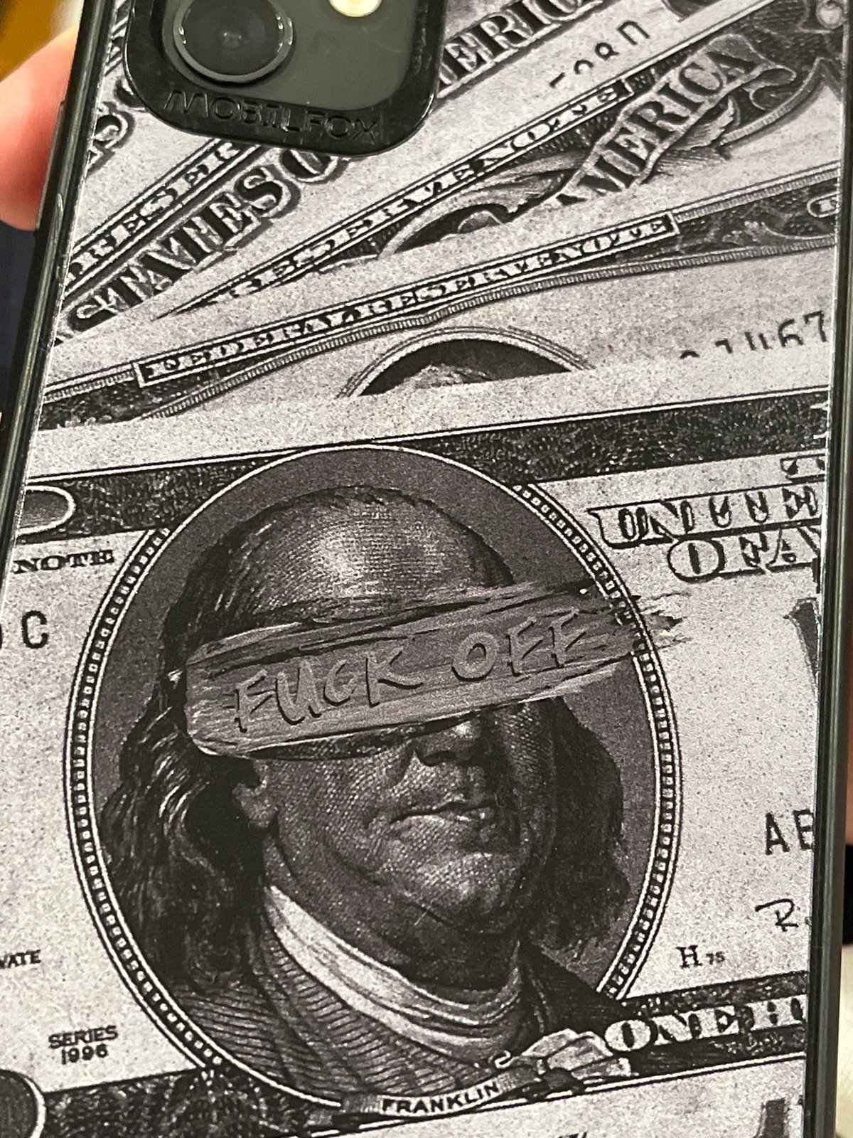 Phone case with dollar bill design spotted in Varna