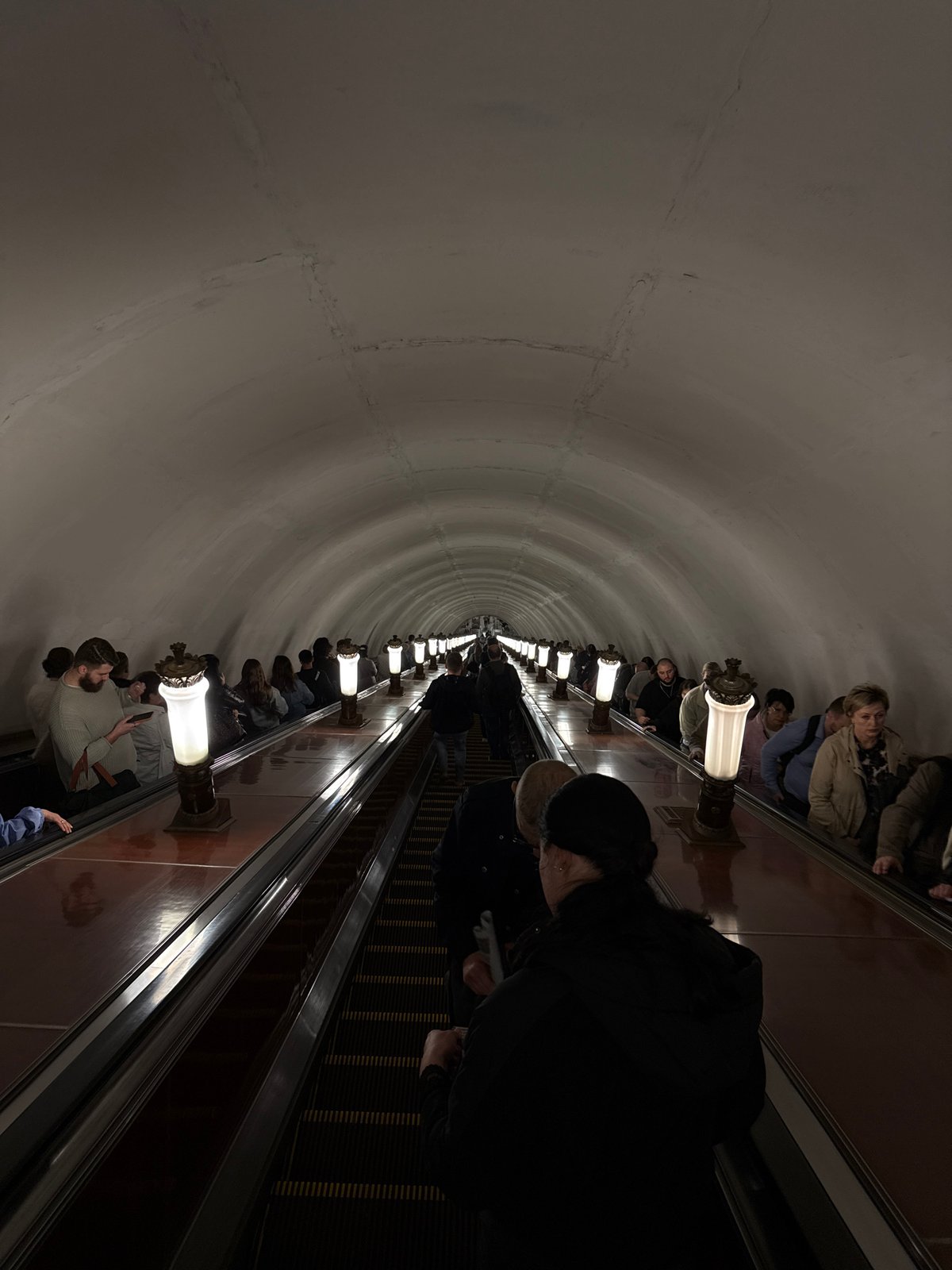 Moscow resident documents metro, architecture, street clock in brief walkabout