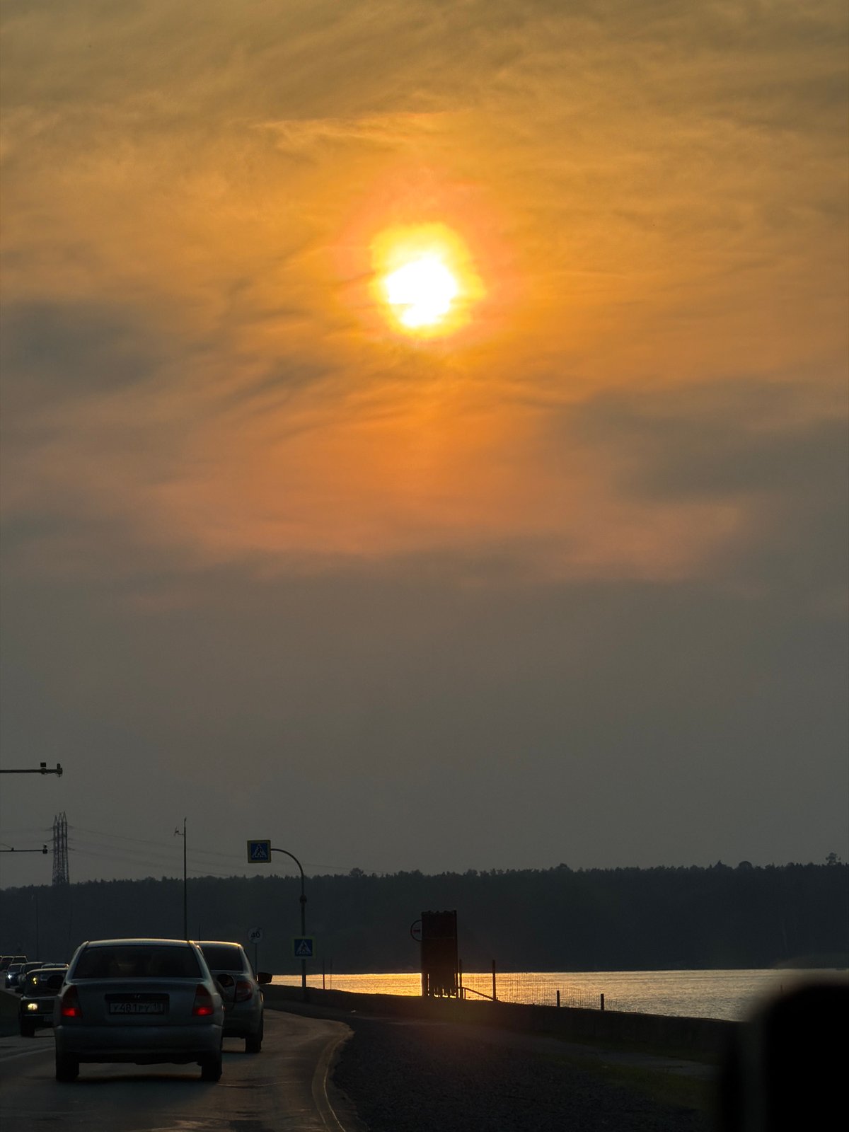 Road trip through Chaikovsky under a hazy summer sun
