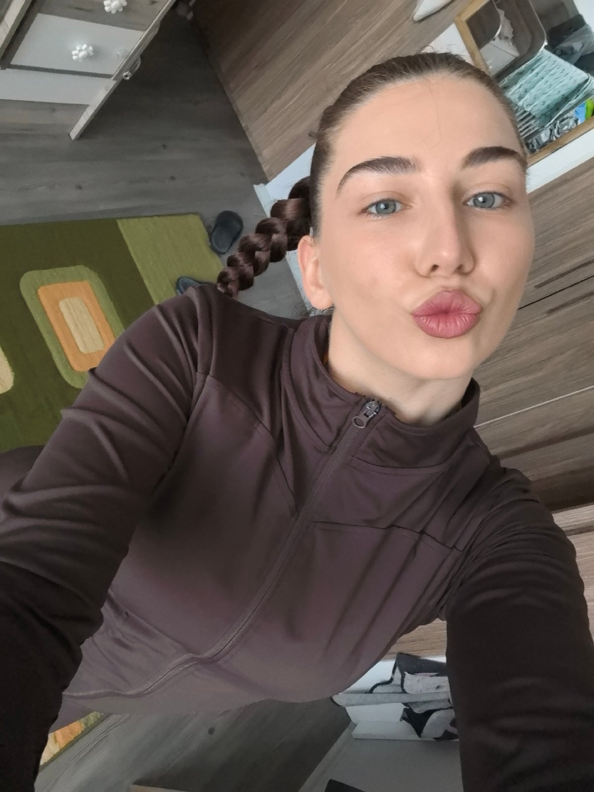 Woman takes selfie in residential setting in Stara Zagora