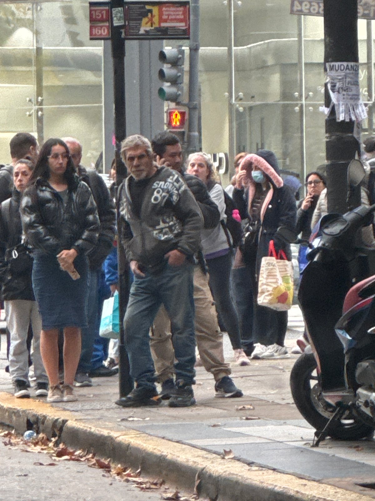 Buenos Aires street incident involves bus, pedestrians, person on road