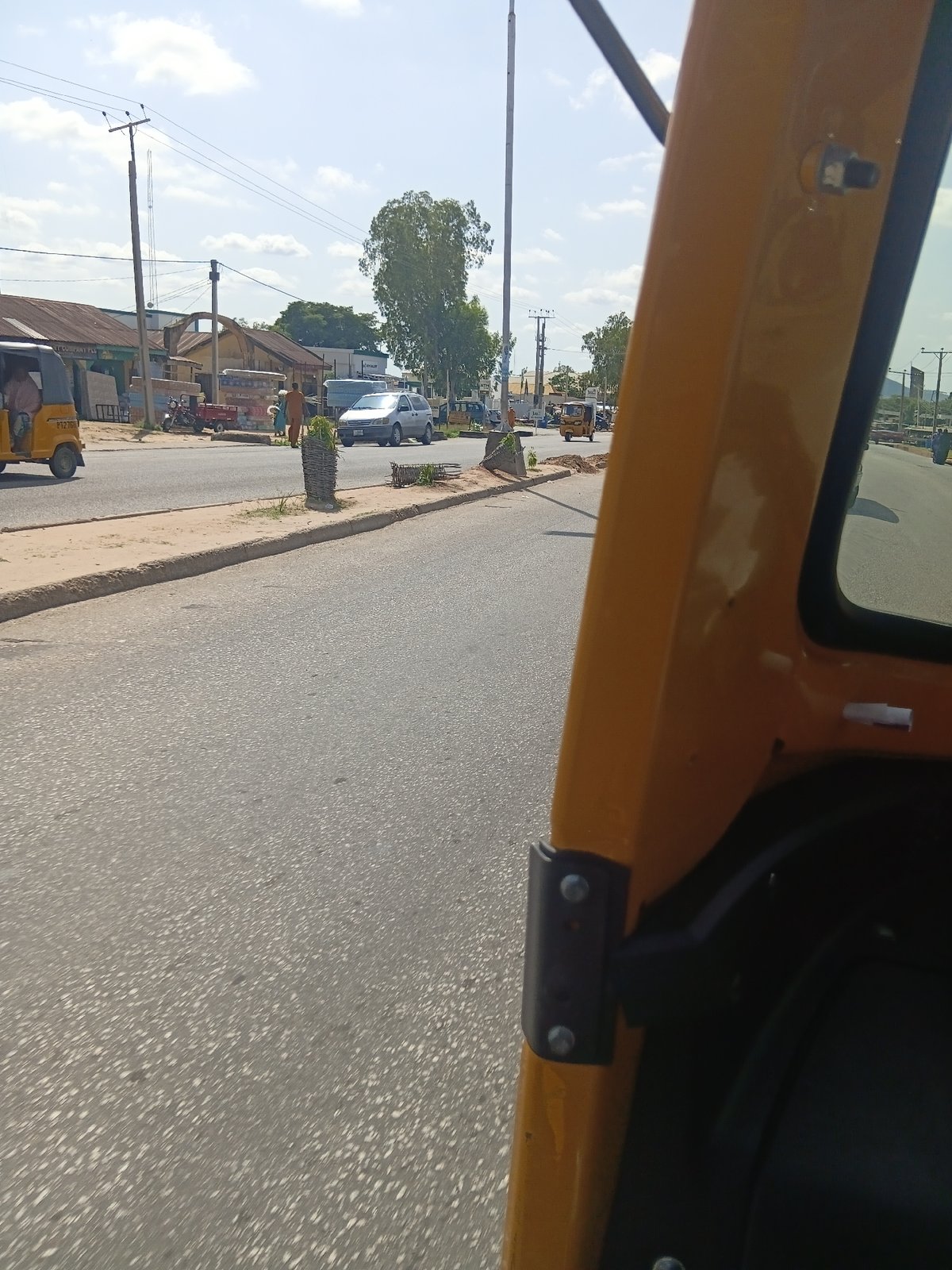 Street life documented in Jalingo, Nigeria during afternoon hours