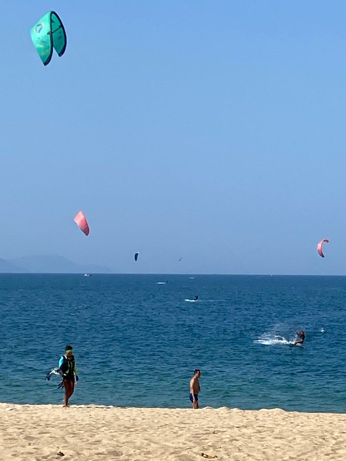 Kitesurfing morning session on Nha Trang's sunny beachfront