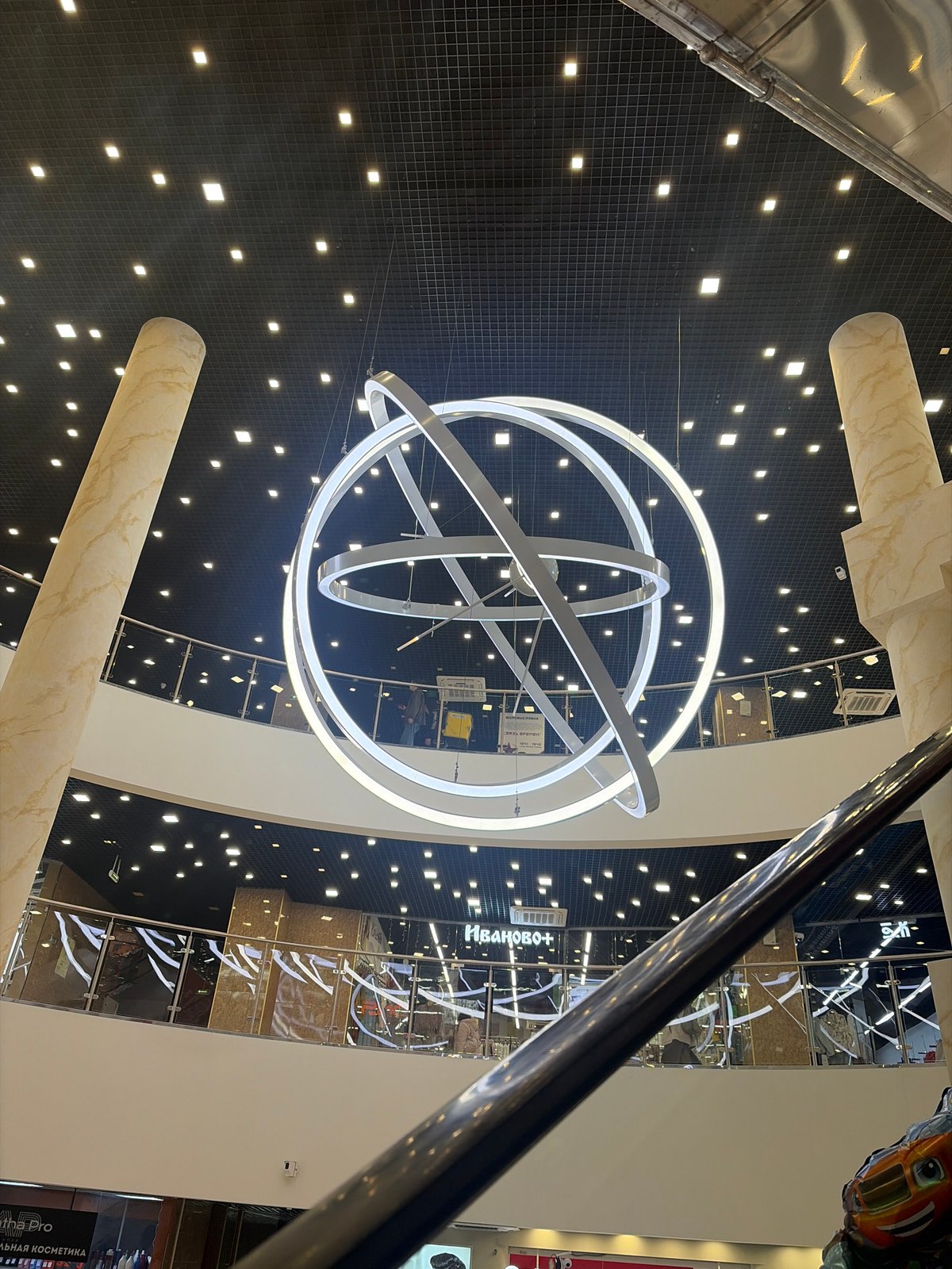 Circular light fixture photographed in Saint Petersburg shopping mall
