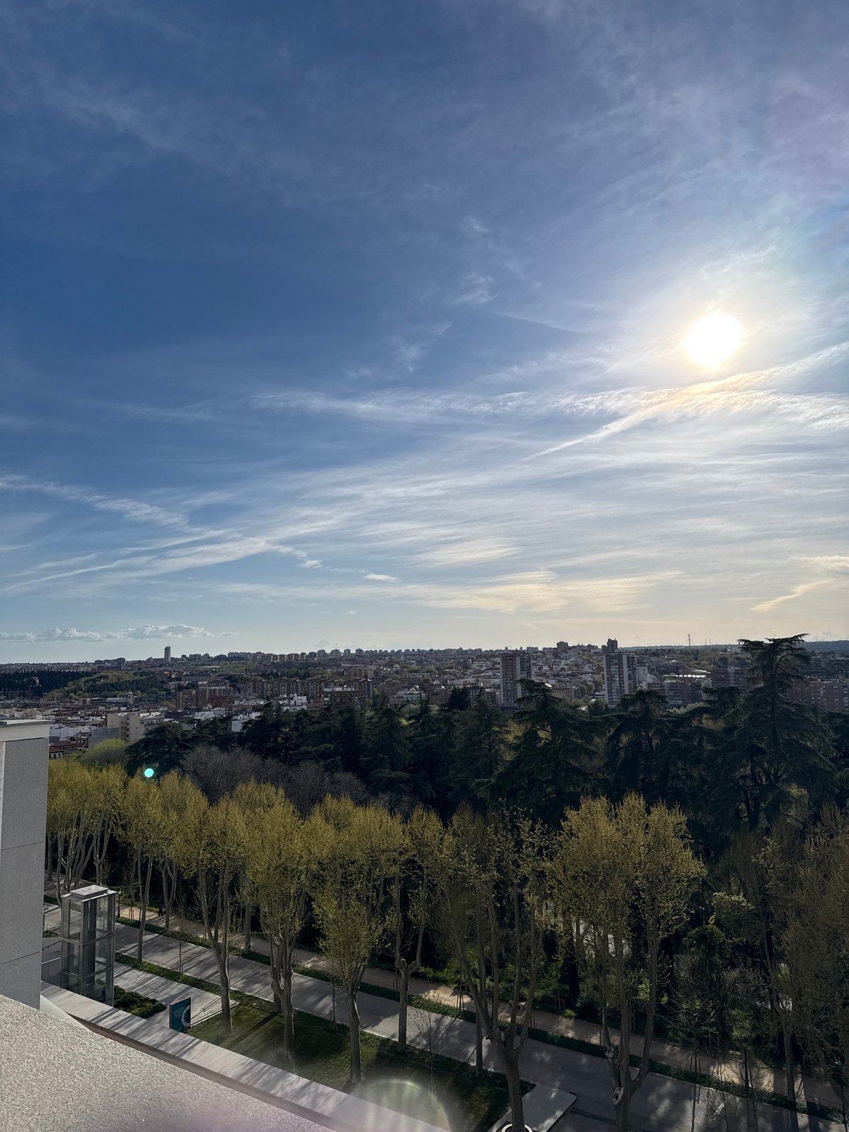Aerial view captures Madrid cityscape under clear skies