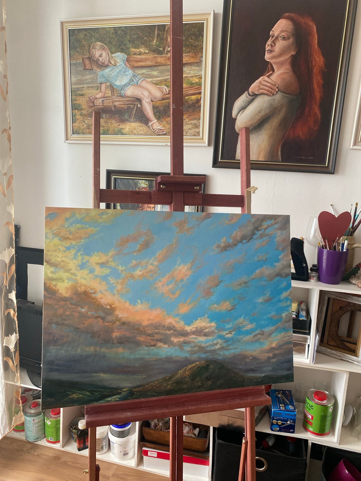 Inside a Bílina oil painter's studio, works in progress on display