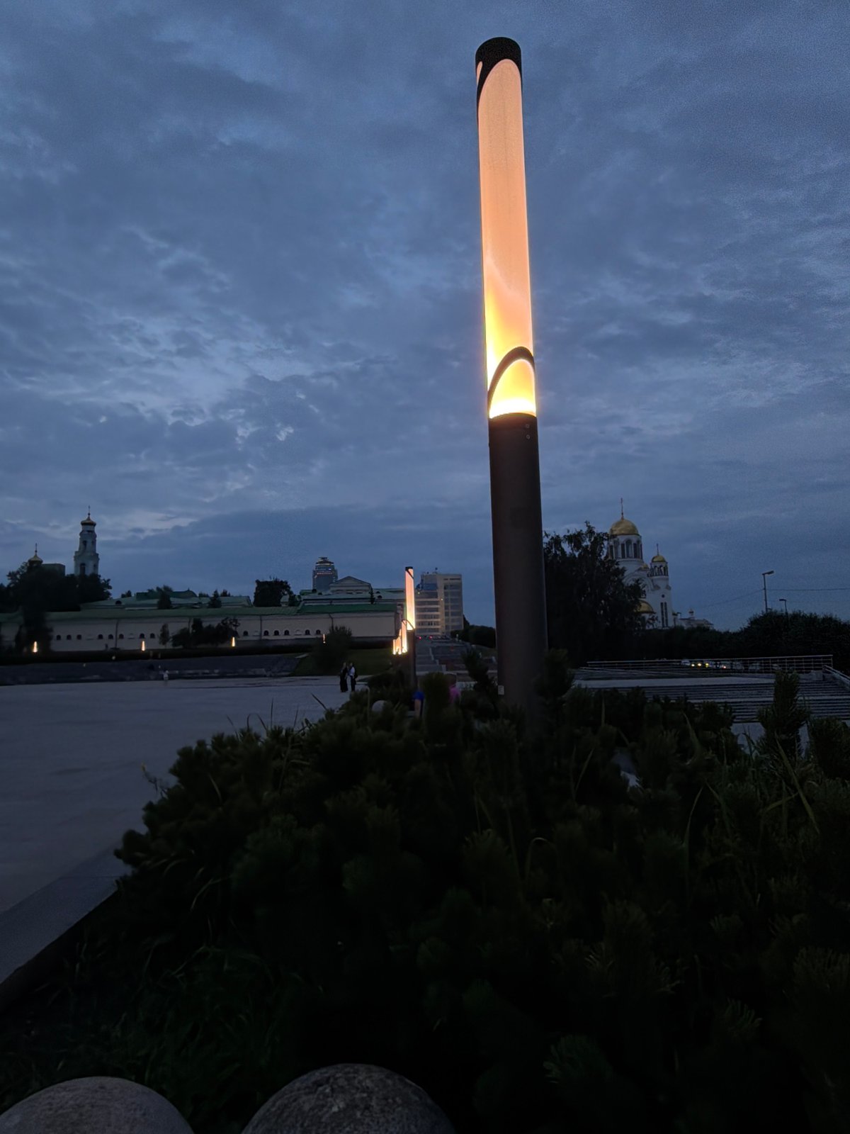 Yekaterinburg at dusk: architecture, sculpture, and city lights