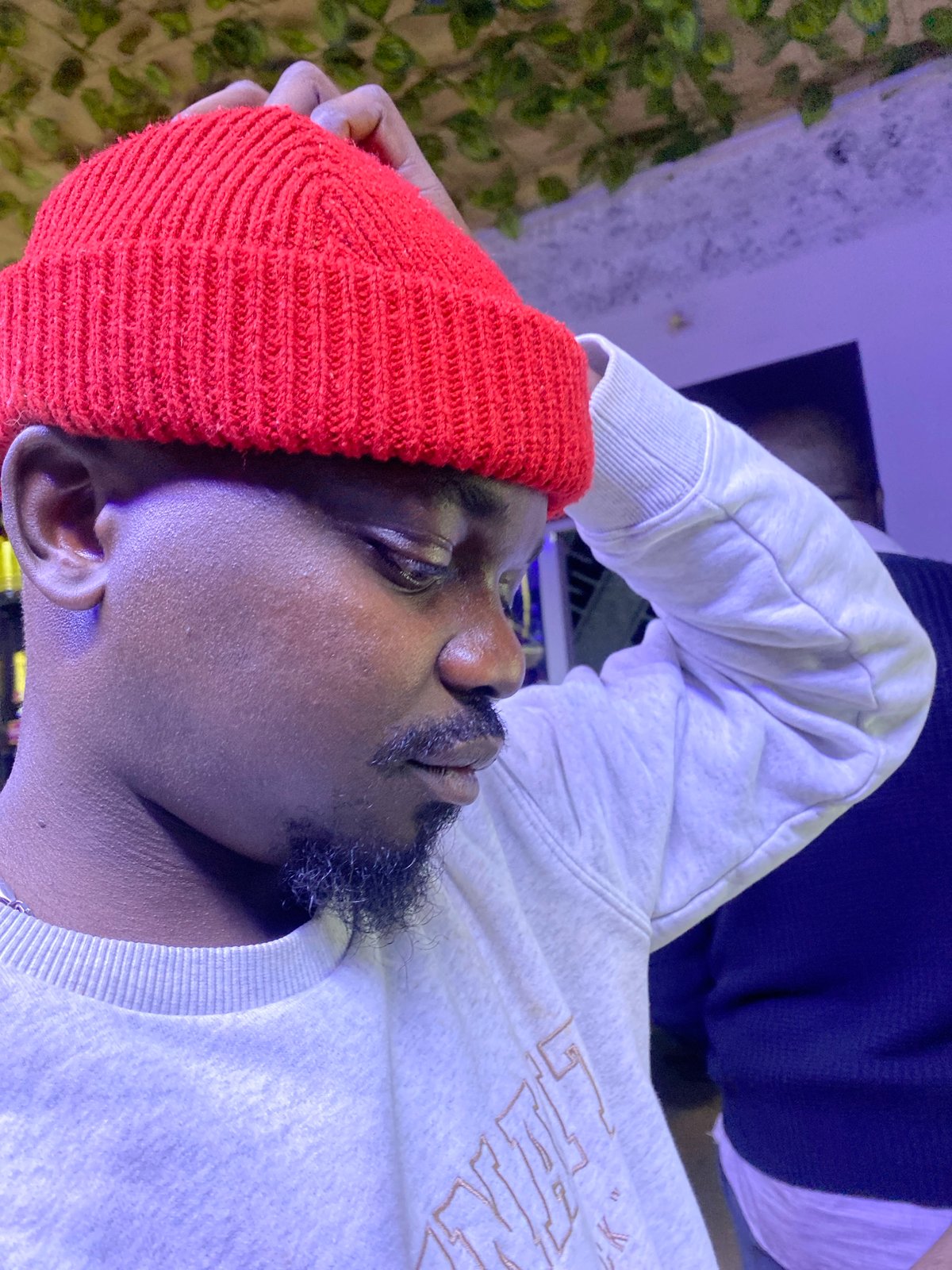 Evening gathering at Nigerian shop captured in 17 memories