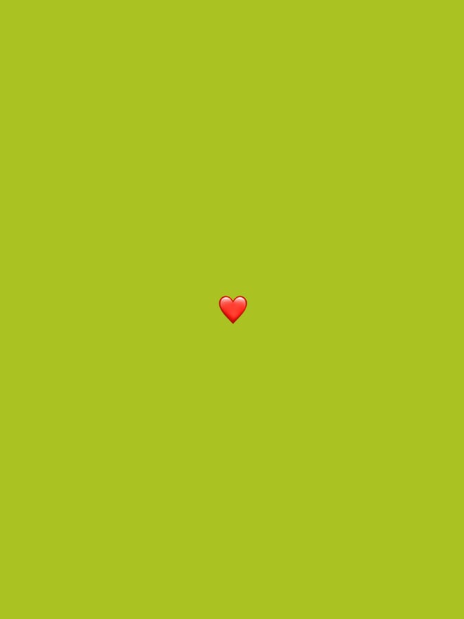 Red heart emoji observed on chartreuse background in Erba