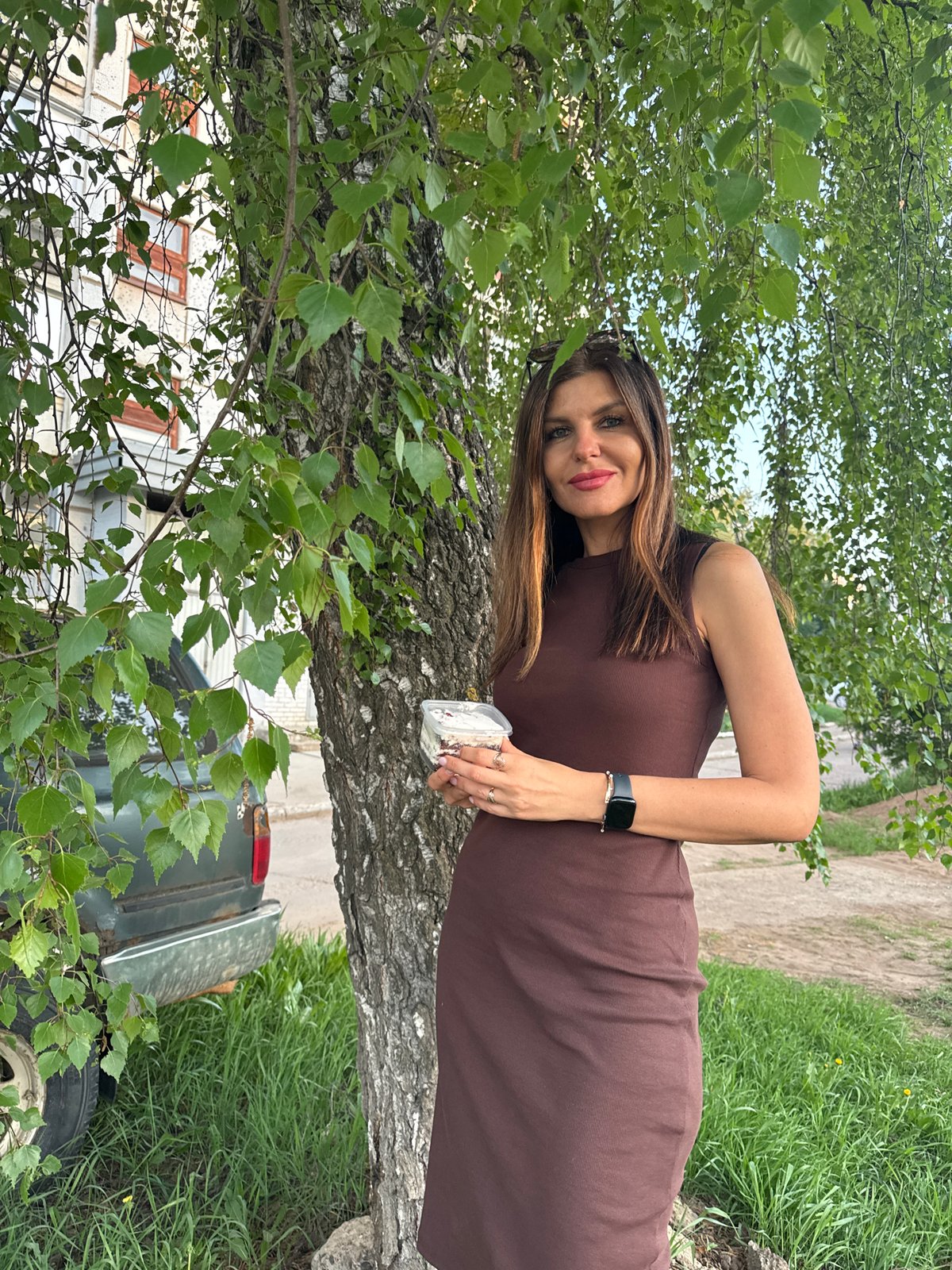 Woman photographed near birch tree, takes selfies in Chaikovsky
