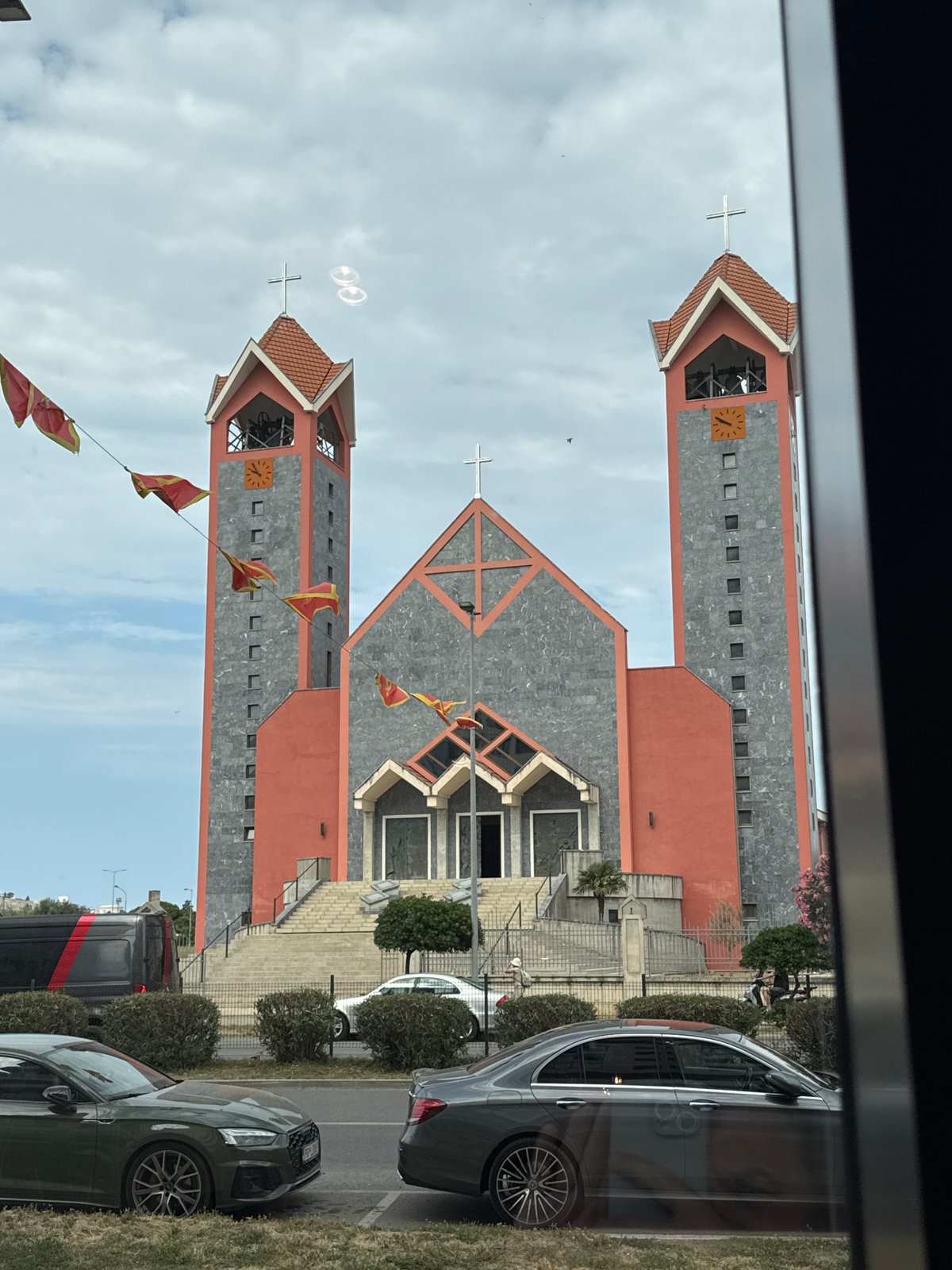Coffee and pastries with a church view in Montenegro