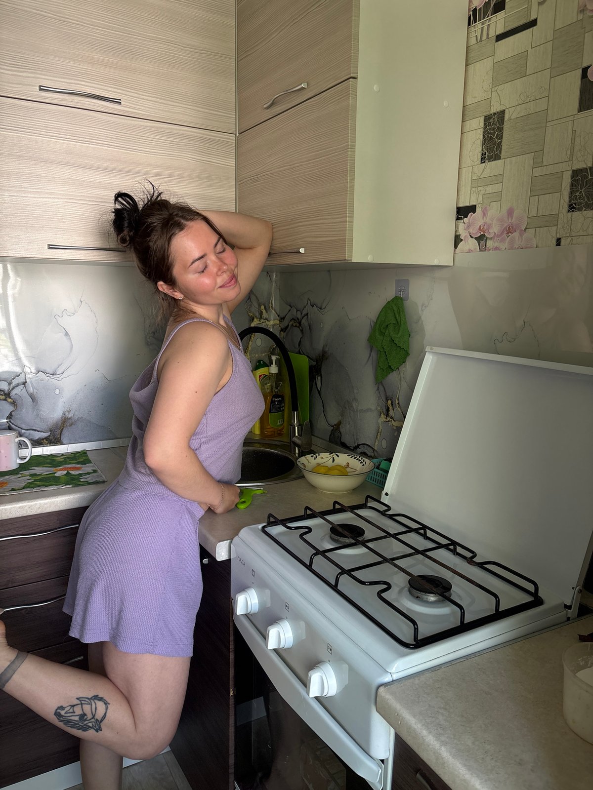 Morning domestic moments captured across Izhevsk kitchens