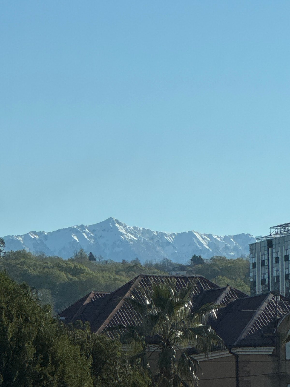 Clear skies and snow-capped peaks captured in Sirius, Russia