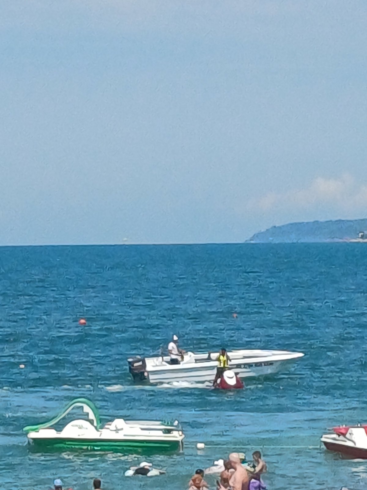 Sochi's Black Sea beach buzzing with boats and beachgoers