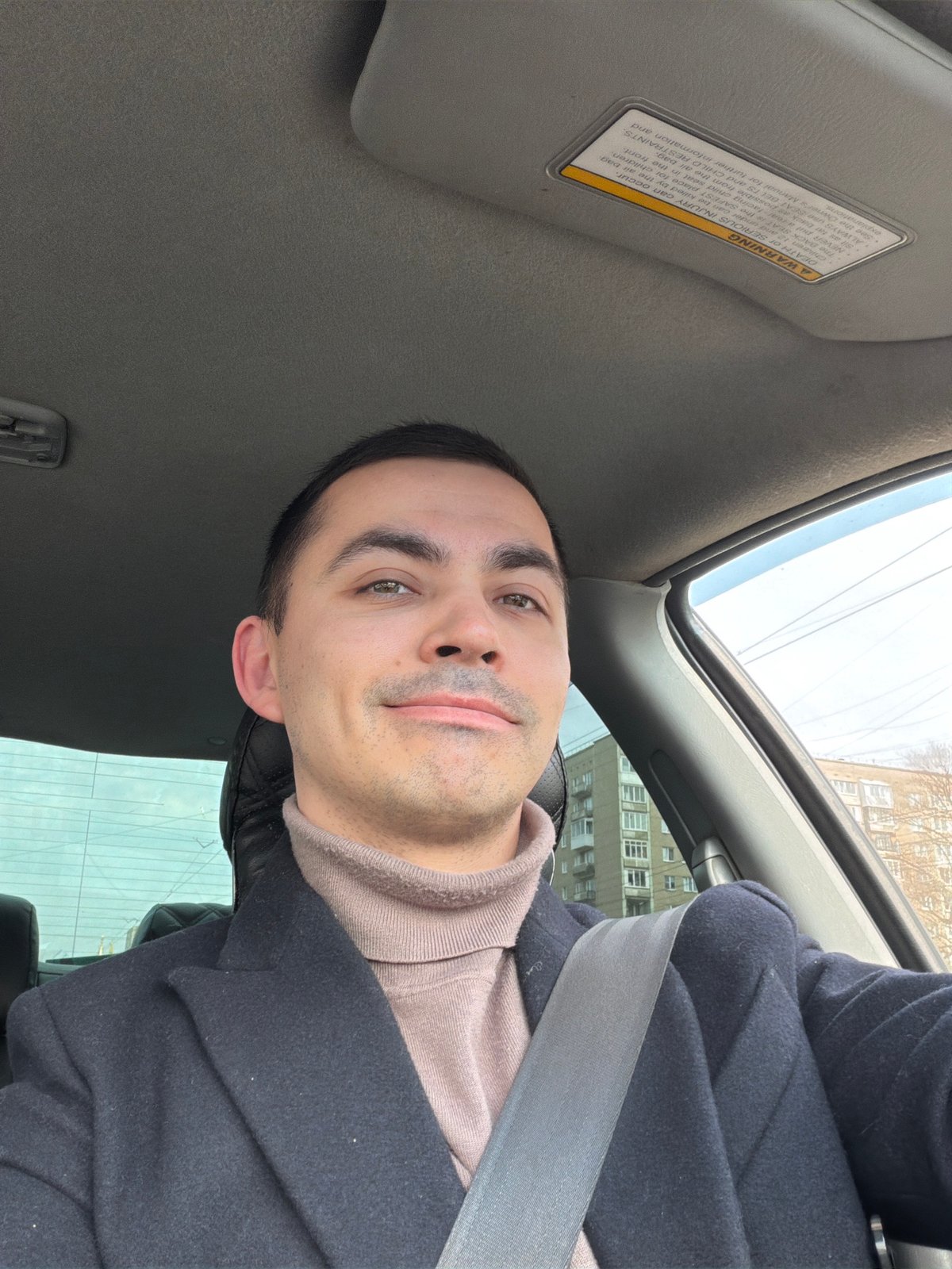 Man takes selfies in car in Izhevsk, Russia