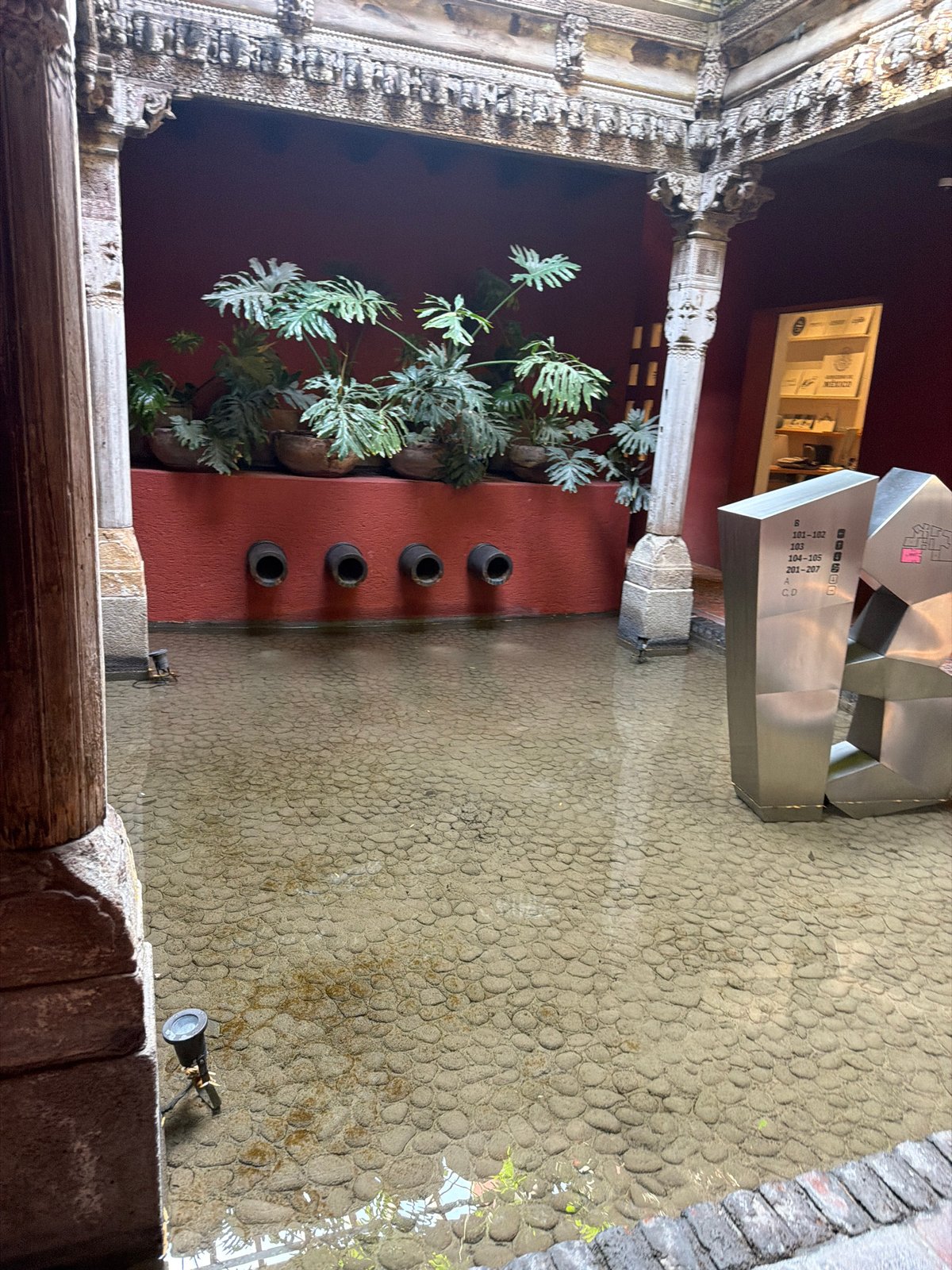 Colonial courtyard with cobblestone surface documented in Puebla