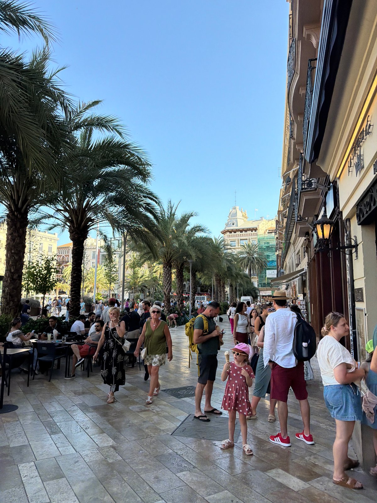 Tourist documents European city walkabout with architecture and cuisine